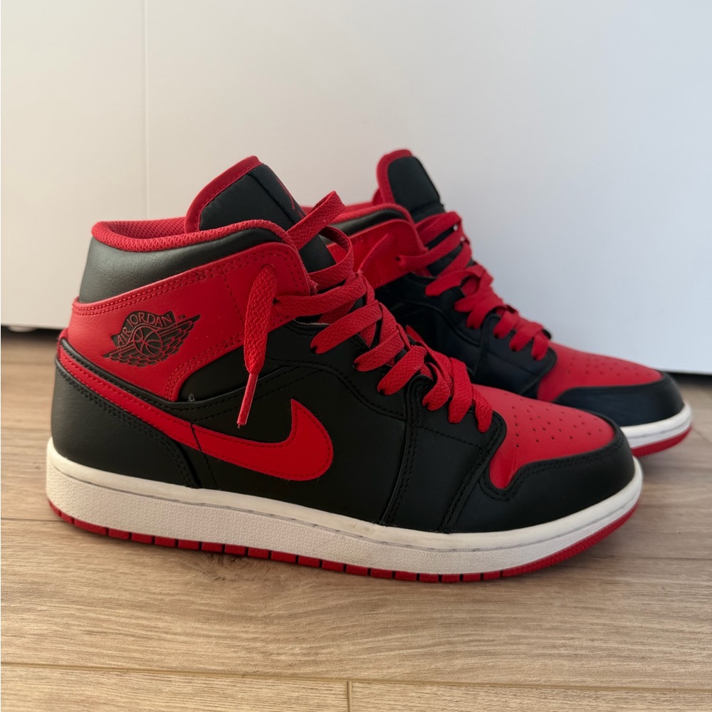 Nike Air Jordan Black and Red High Tops